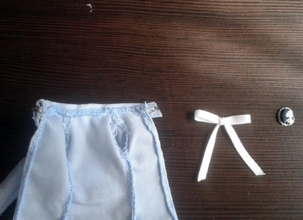 Comment coudre des vêtements de poupée avec vos propres mains