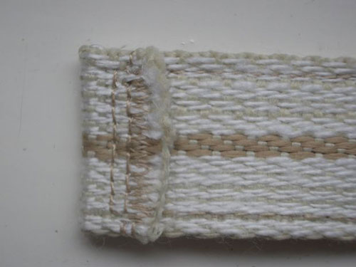 La deuxième extrémité de la ceinture