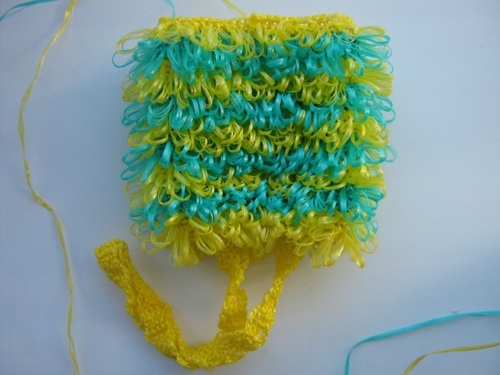 Comment attacher un crochet de loofah?