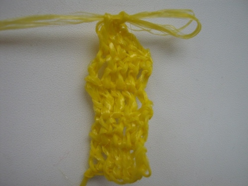 Comment attacher un crochet de loofah?