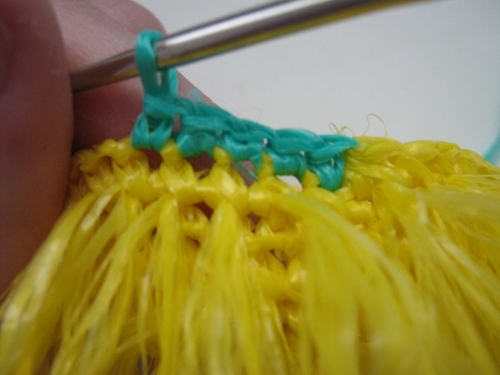 Comment attacher un crochet de loofah?