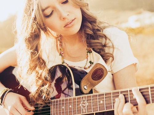 Comment apprendre à jouer des chansons à la guitare?