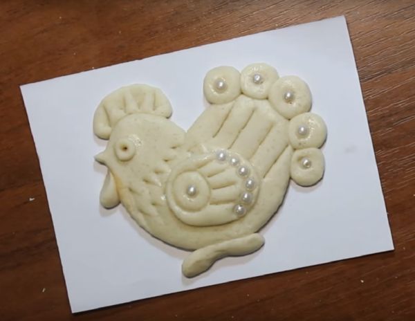 Coq de ses propres mains
