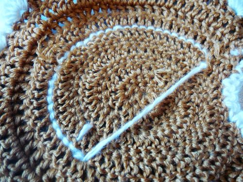 Comment attacher un crochet sous la forme d'un poulet