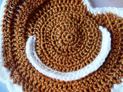 Comment attacher un crochet sous la forme d'un poulet