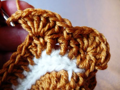 Comment attacher un crochet sous la forme d'un poulet