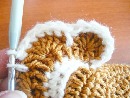 Comment attacher un crochet sous la forme d'un poulet