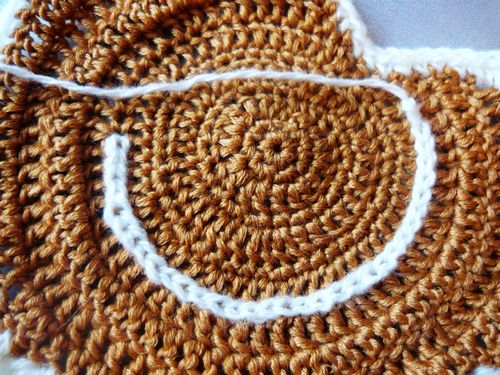 Comment attacher un crochet sous la forme d'un poulet