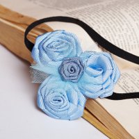 Roses de rubans avec leurs propres mains