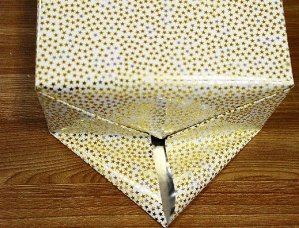 Comment emballer un cadeau dans un papier cadeau
