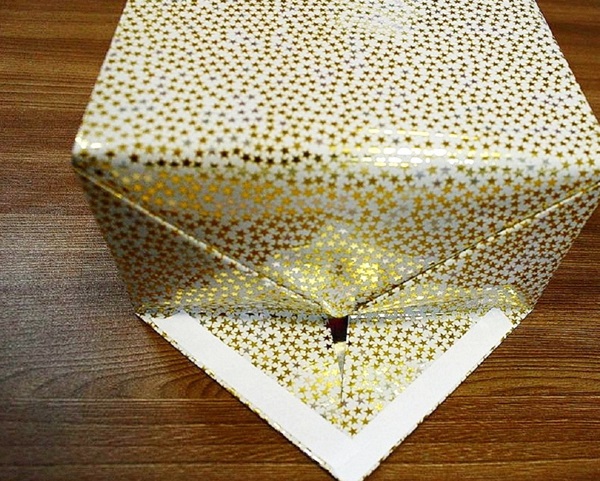 Comment emballer un cadeau dans un papier cadeau