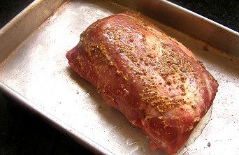 Comment faire cuire un cou de porc dans un four Image d'une recette de cou de porc cuit au four