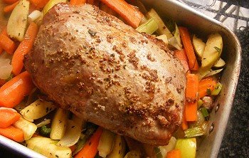 Comment faire cuire un cou de porc dans un four Image d'une recette de cou de porc cuit au four